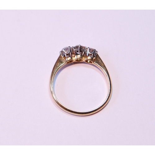 25 - Diamond three-stone ring with old-cut brilliants, the largest .2ct, ‘18ct’, size L.