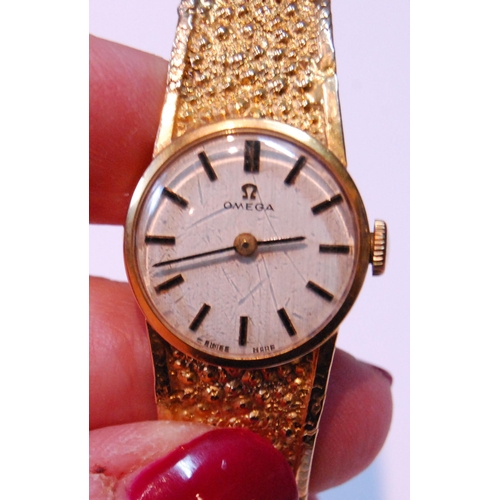 127 - Lady's Omega 9ct gold bracelet watch, 1975, 19g gross.