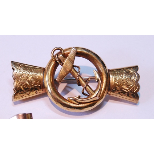 6 - Gold bow brooch, ‘9ct’, another, formerly a bracelet mount with fouled anchor, and anoth... 