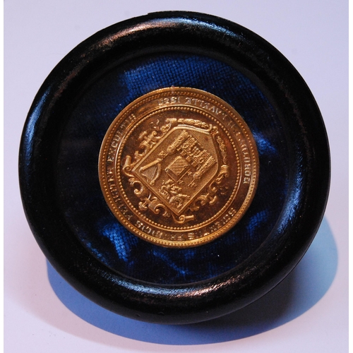 79 - Trinity College, Dublin gold medal, ‘15’, 4cm, 31g, in display case.