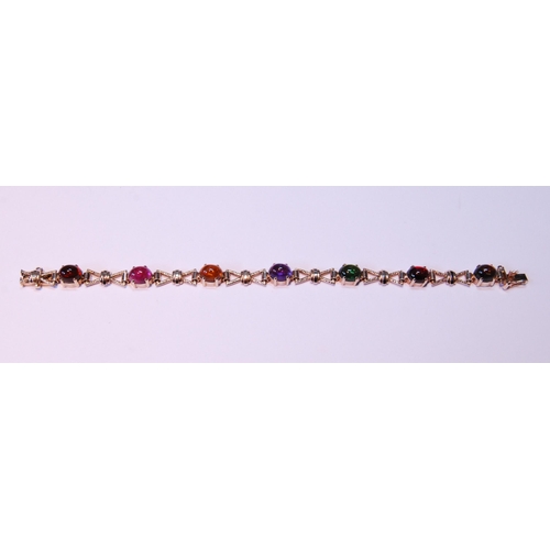 63 - 9ct gold bracelet with cabochon garnet, citrine, amethyst and other gems, 15.5g gross.