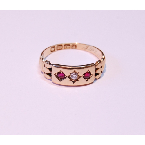 65 - Edwardian 18ct gold ring with a diamond and two rubies, 1894, size M, 2.7g gross.