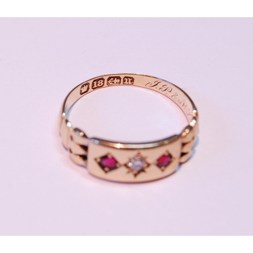 65 - Edwardian 18ct gold ring with a diamond and two rubies, 1894, size M, 2.7g gross.