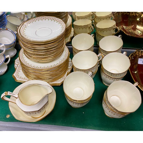 40 - Plant Tuscan cream and gilt tea set including 12 cups and saucers, cake plates, milk jug and bowl