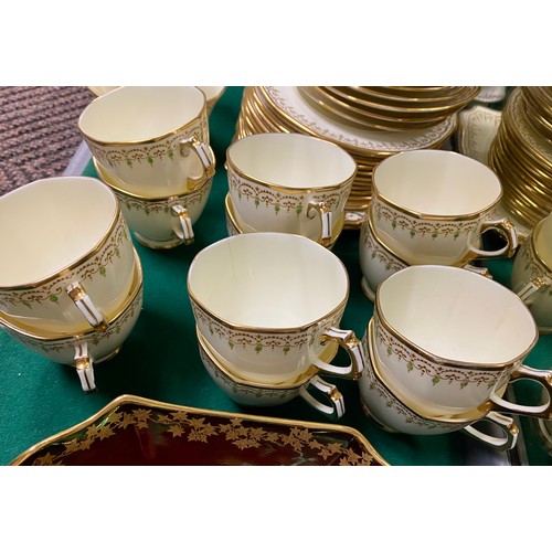 40 - Plant Tuscan cream and gilt tea set including 12 cups and saucers, cake plates, milk jug and bowl