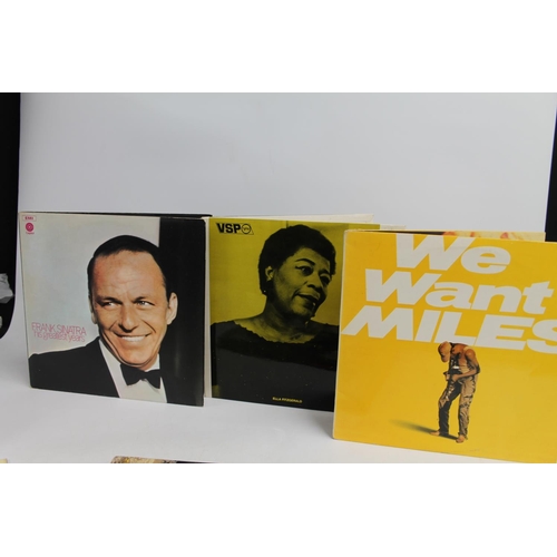 300 - Collection of records to include Miles Davis Collectors Items, two other albums, Frank Sinatra His G... 