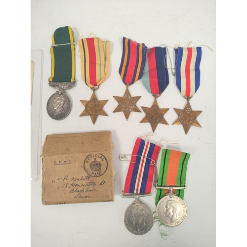 207 - WW2. Medal group presented to Gnr R. Nesbitt R.A 874148 comprising of Territorial Efficiency Medal, ... 