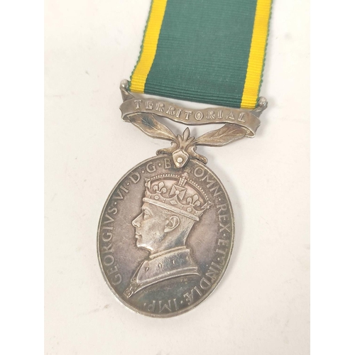 207 - WW2. Medal group presented to Gnr R. Nesbitt R.A 874148 comprising of Territorial Efficiency Medal, ... 