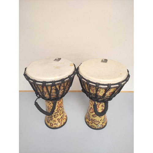 286 - Pair of Toca bongos with faux snakeskin covers. (2)