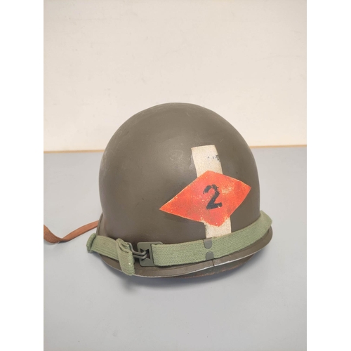 211 - Belgian M51 M1 helmet complete with liner dated 1953. 