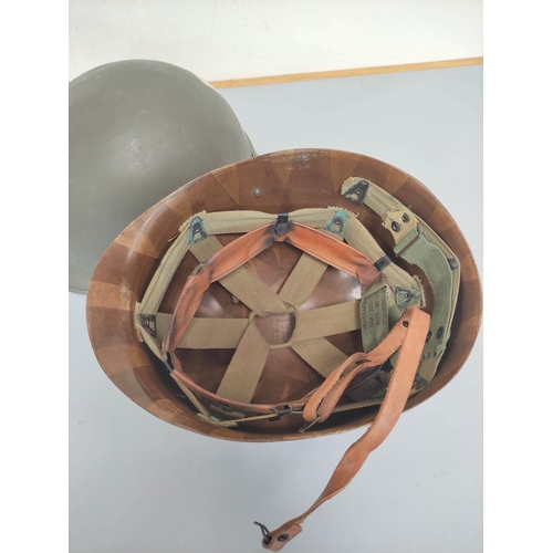 211 - Belgian M51 M1 helmet complete with liner dated 1953. 