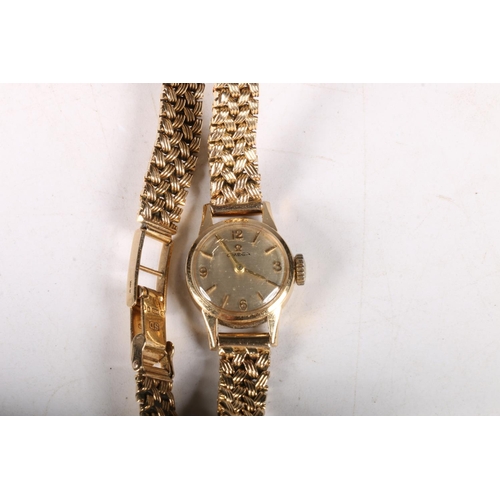 166 - 9ct gold cased Omega ladies wrist watch, cal 483, on 9ct gold bracelet, 21.4g.