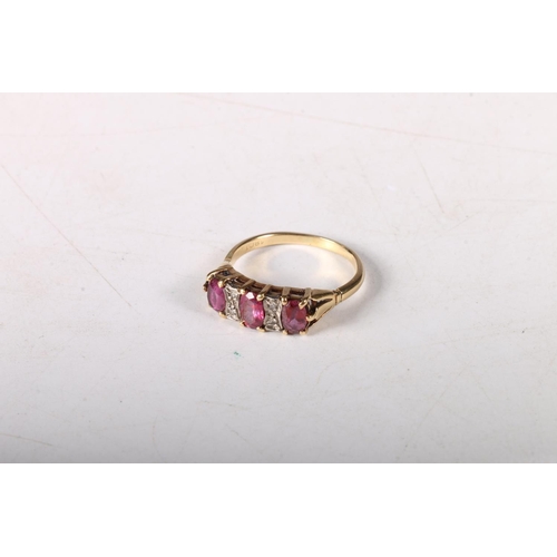 191 - 18ct gold dress ring with three oval cut pink stones separated by illusion set chip diamonds, size O... 