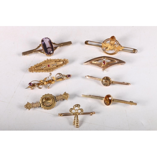 207 - Collection of 9ct gold and yellow metal bar brooches with gems and seed pearls, (9)