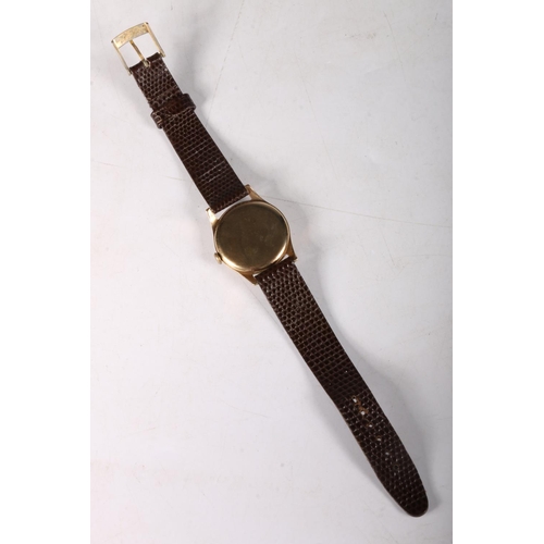 209 - 9ct gold cased Marvin gentleman's wristwatch on leather strap, dial 2.5cm.