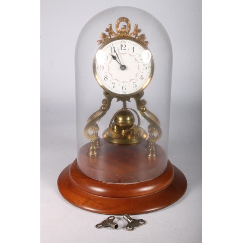 380 - Gustav Becker brass torsion clock the enamel dial with arabic numerals on a brass skeleton frame wit... 