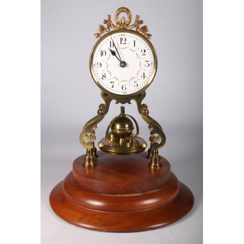 380 - Gustav Becker brass torsion clock the enamel dial with arabic numerals on a brass skeleton frame wit... 