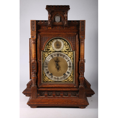 384 - Late 19th century continental oak bracket clock by Winterholder & Hoffmeier, The gothic style cl... 