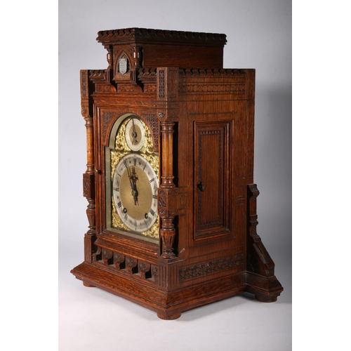 384 - Late 19th century continental oak bracket clock by Winterholder & Hoffmeier, The gothic style cl... 