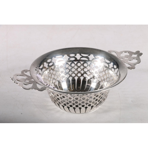 66 - Birmingham late 19th Century silver strainer , maker D & I, 16cm diameter, weight 58.4g.