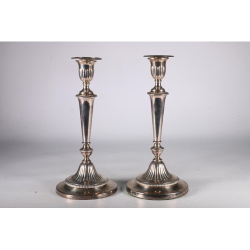 70 - Pair of silver weighted candlesticks, hallmarks rubbed, possibly Sheffield, John Green, 30cm tall.