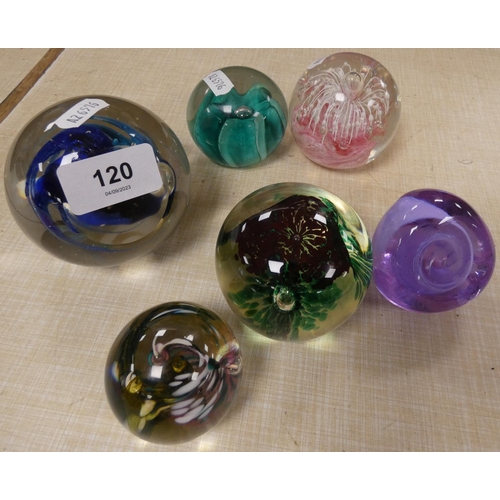 120 - Six modern glass paperweights.