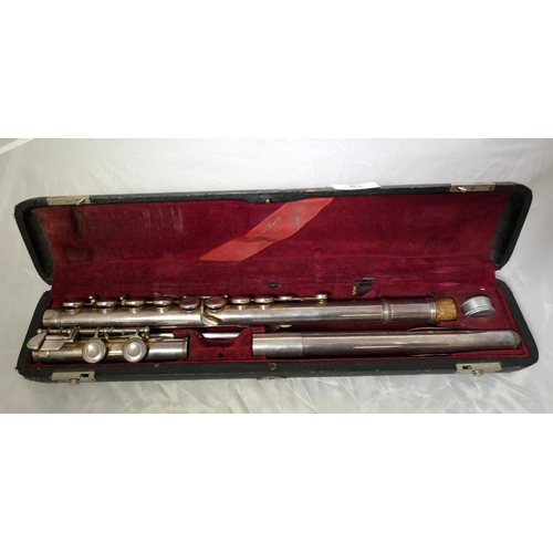 64 - V.Kohlert and Winnenden three piece flute in fitted case.