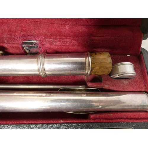 64 - V.Kohlert and Winnenden three piece flute in fitted case.