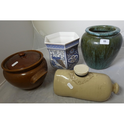 65 - Glazed garden planter, a lidded crock, a jardinière and a foot warmer.