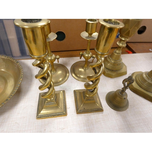 99 - Three pairs of brass candlesticks, a bowl and a bell.