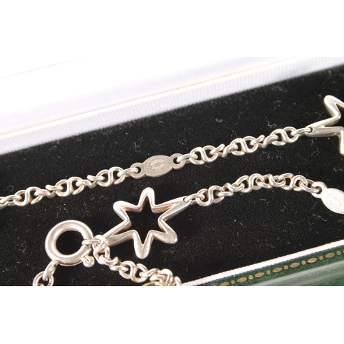 251 - Georg Jensen silver pierced star necklace, 87cm