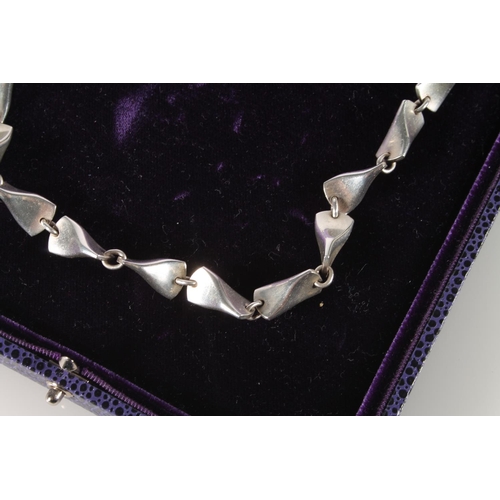 255 - George Jensen silver axe head style necklace, 38cm.