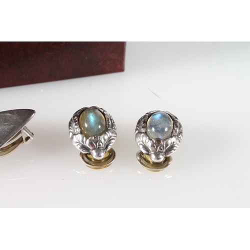 257 - Pair of Georg Jensen silver fin style clip on earrings, and another pair with foliate design and iri... 