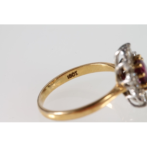 112 - 18ct gold cluster ring with 10 diamonds encircling purple/red oval cut stone, size N, 3.8g,