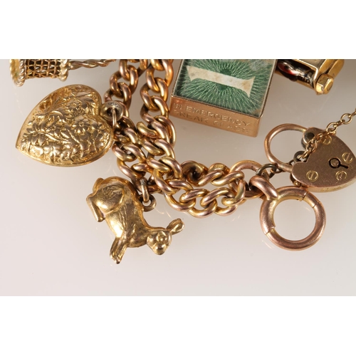 118 - 9ct gold charm bracelet with quantity of charms, including a sovereign and half sovereign, 57g gross... 