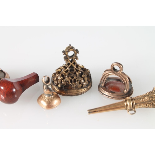 124 - Group of six yellow and gilt metal seals with varied intaglios with crests, 4cm. 