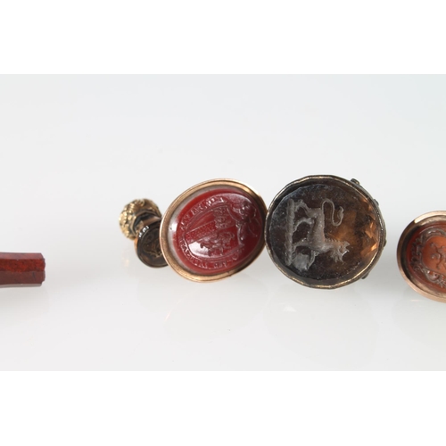 124 - Group of six yellow and gilt metal seals with varied intaglios with crests, 4cm. 