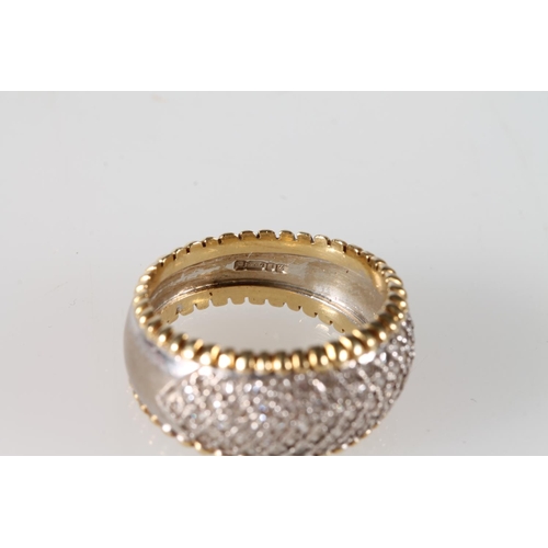 127 - 18ct gold dress ring with diamond set field and beaded edge, size M/N, 6.9g.