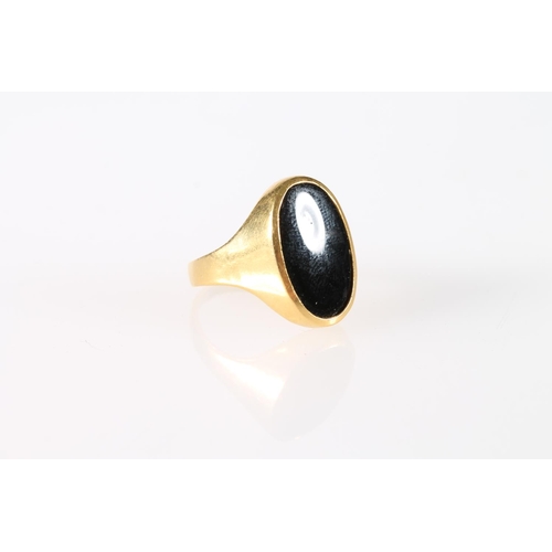 131 - Onyx signet ring, size N/O, stamped 22c AJ, 6.8g.