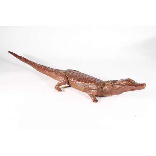 373 - Painted cast bronze figure of crocodile, 73cm.