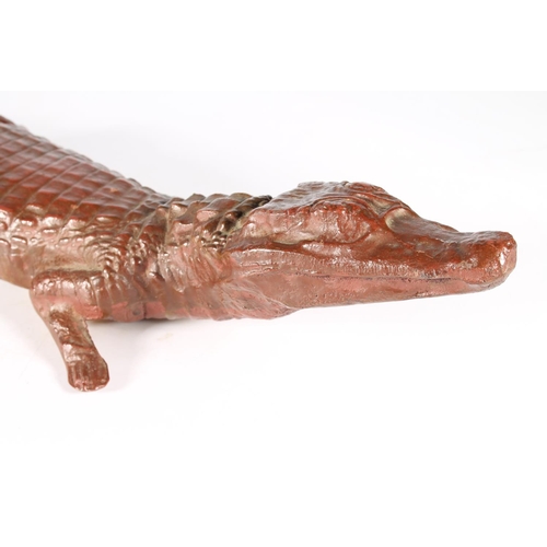 373 - Painted cast bronze figure of crocodile, 73cm.