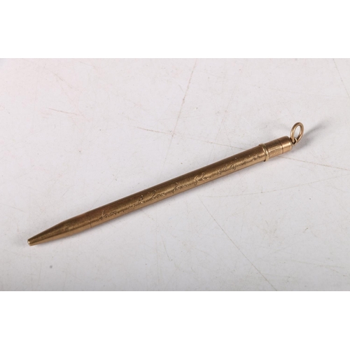 237 - 9ct gold pencil with engine turned exterior and inscription, 9cm, 7.2g. 