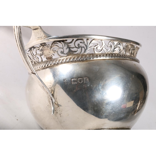 40B - Edward VII silver bachelor tea service with foliate pierced rims and lion rampant to sides, hallmark... 