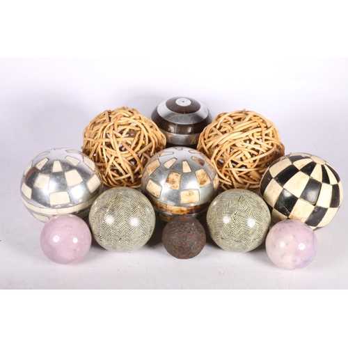 405 - Group of carpet boules, including bone and ebony, and other balls, also small cannonball (?). 