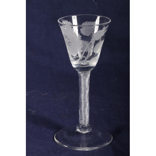 409 - 18th Century wine glass with 'Jacobite' engravings on multi series air twist, 15cm.