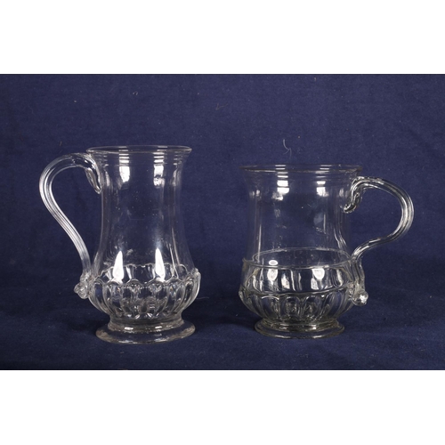 413 - Early 18th Century glass mug, silver shape and another similar mug of narrower section (2).