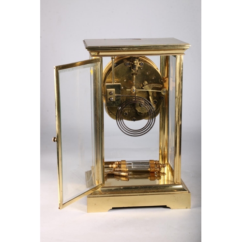 379 - French brass four glass mantel clock circa early 20th century with twin train movement striking on a... 