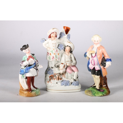 430 - Three Staffordshire figures including courting couple spill vase, 19cm, and two aristocratic gentlem... 