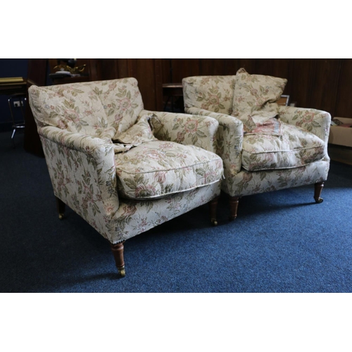 542 - Howard and Sons of London, a pair of 19th century armchairs upholstered in floral patterned fabric, ... 