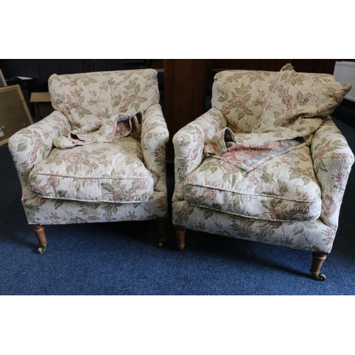 542 - Howard and Sons of London, a pair of 19th century armchairs upholstered in floral patterned fabric, ... 